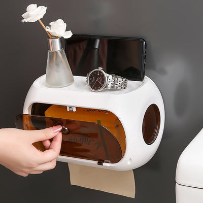 Multifunctional waterproof tissue box with suction for easy wall mounting in the bathroom. Conveniently stores tissues while saving counter space, made from durable, water-resistant material for long-lasting use