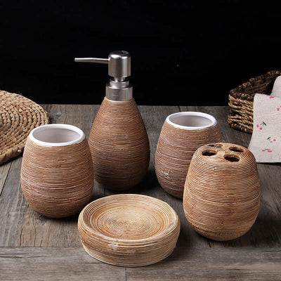 European style ceramic bathroom five-piece set, including soap dispenser, toothbrush holder, tumbler, soap dish, and lotion pump. Elegant design and durable ceramic material for a stylish and functional bathroom