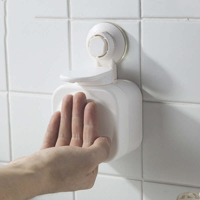 Bathroom manual soap dispenser with suction cup, white ABS design, modern and simple style for convenient use.