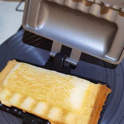 Sandwich baking tray suitable for gas and induction cookers. Durable and heat-resistant, this versatile tray is perfect for making sandwiches, toasts, and other baked treats on various cooking surfaces